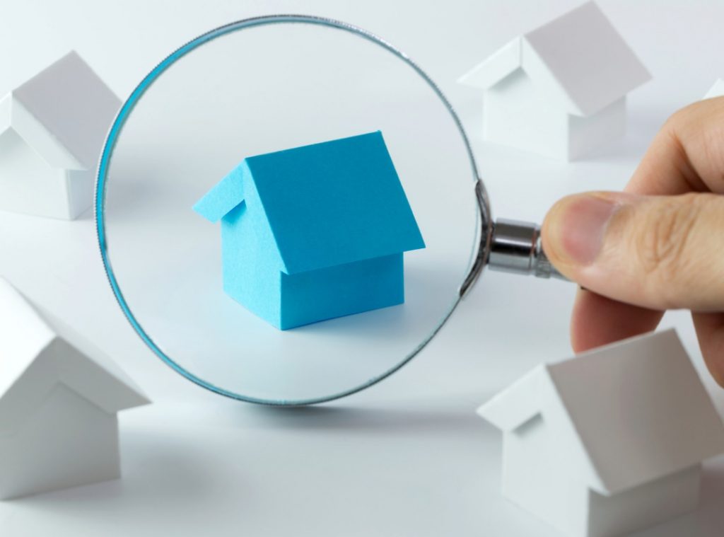 home under a magnifying glass
