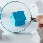 home under a magnifying glass
